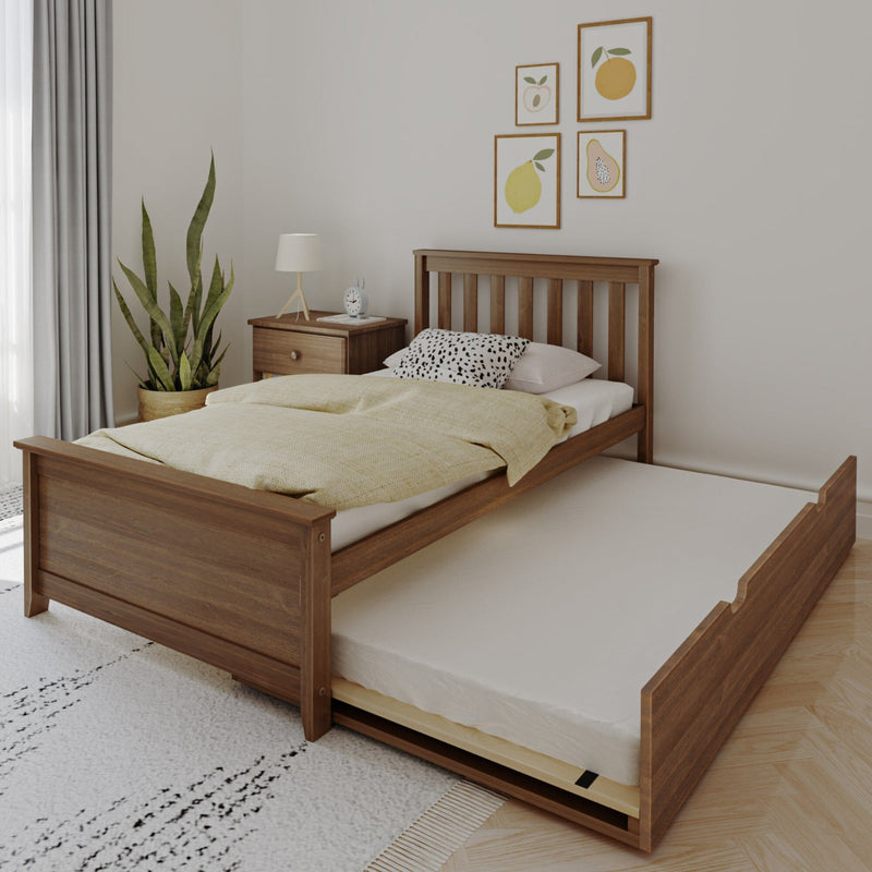 Modern minimalist bedroom with wooden trundle bed, yellow bedding, bedside table with lamp, potted plant and fruit wall art