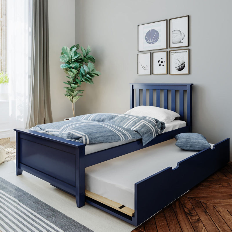 Navy blue twin bed with pull-out trundle, blue striped bedding, sports-themed framed wall art and fiddle leaf fig plant in modern kids' bedroom decor