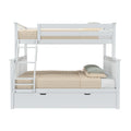White wooden bunk bed with ladder, under-bed storage drawer, beige bedding and green gingham pillows on white background
