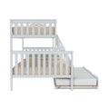 White wooden twin-over-twin bunk bed with ladder and pull-out trundle, beige textured bedding and safety guardrails — space-saving kids loft bed