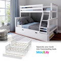 White wooden convertible bunk bed with ladder and pull-out trundle in a modern kids' bedroom with gray and blue bedding, separates into two freestanding beds