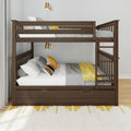 Dark wood twin-over-full bunk bed with built-in ladder and storage drawer, gray and yellow bedding and brass wall sconces in a modern kids' bedroom