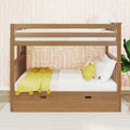 Natural wood bunk bed in a children's bedroom with pastel pink geometric wallpaper, white bedding, yellow throw blanket and pom-pom pillow, under-bed storage drawer and green plant
