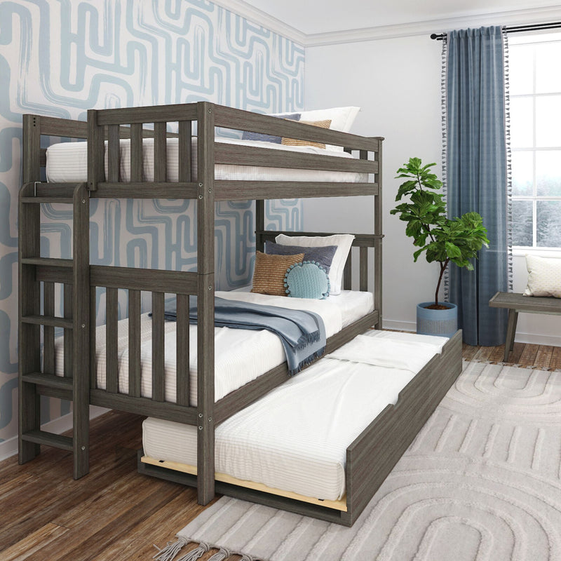 Gray wooden bunk bed with pull-out trundle in modern kids bedroom with blue geometric wallpaper, blue curtains, decorative pillows and potted plant