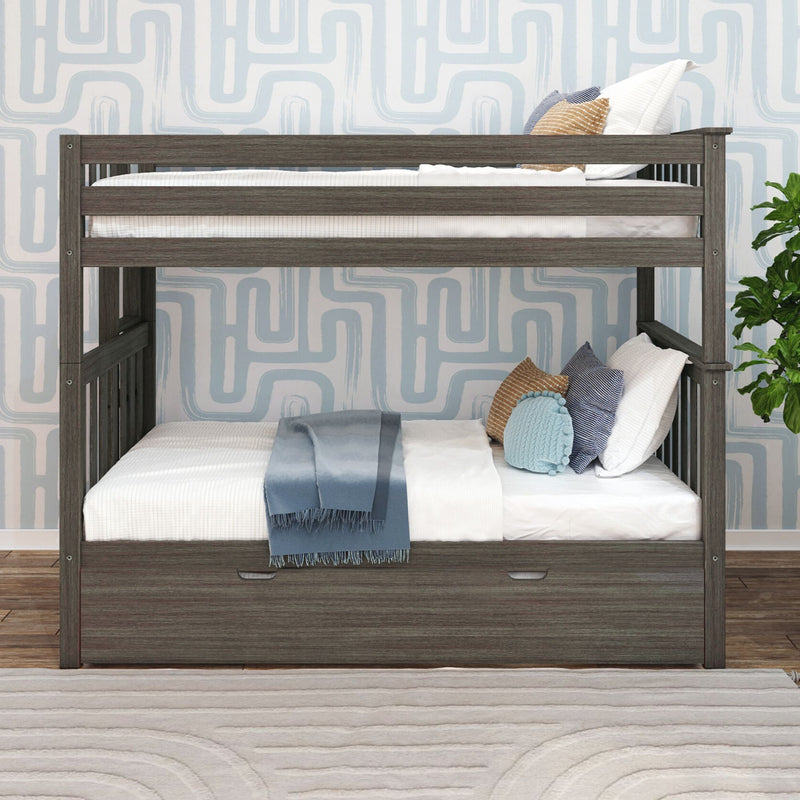 Gray wood twin-over-full bunk bed with under-bed storage drawer, white linens, blue throw and decorative pillows against blue geometric wallpaper in a modern kids' bedroom