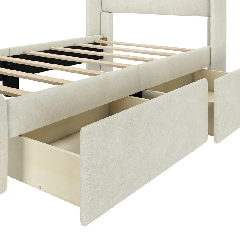 Cream fabric upholstered platform bed frame with wooden slat support and pull-out underbed storage drawers, close-up