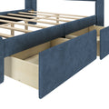 Modern blue upholstered platform bed frame with wooden slats and under-bed pull-out storage drawers