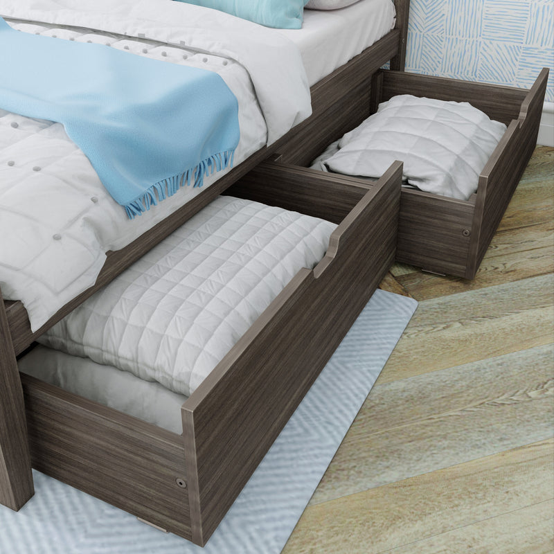 Wooden platform bed with under-bed pull-out storage drawers and white quilted bedding, light blue throw blanket on hardwood bedroom floor
