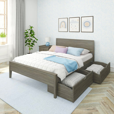 Wooden storage bed with open under-bed drawers in a contemporary bedroom with pastel bedding, nightstand lamp, indoor plant, framed wall art and light blue patterned wallpaper