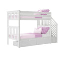 White wooden twin-over-twin bunk bed with built-in storage drawers, side stairs and pink bedding, modern kids loft bed