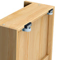 Light wood cabinet edge with white swivel caster wheels and metal mounting brackets, furniture casters for easy mobility