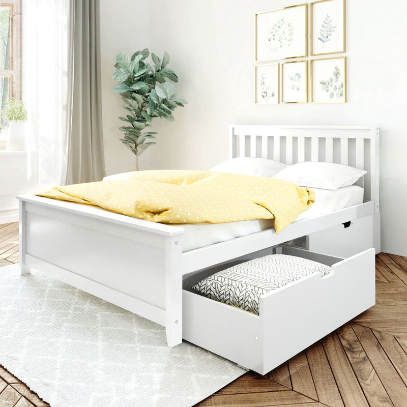 Minimal white storage bed with pull-out drawer and yellow polka-dot duvet in bright modern bedroom with plant and botanical wall art