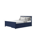 Navy blue wooden twin-size storage bed with under-bed drawers, gray textured bedding and white accent pillow, modern bedroom furniture