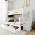 White wooden bunk bed with stairs and pull-out storage drawers in a bright minimalist kids' bedroom with pink bedding and framed animal prints