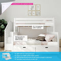 White wooden loft bunk bed with staircase and built-in storage drawers, safety rails and cozy bedding in a modern children’s bedroom with framed animal wall art
