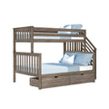 Twin-over-full wooden bunk bed with staircase and under-bed storage drawers, gray-brown finish and blue bedding — space-saving kids' bedroom furniture