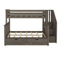 Gray wood loft bunk bed with built-in staircase, under-bed storage drawers and platform slats — farmhouse-style kids twin-over-full bunk bed