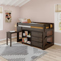 Dark wood loft bed with built-in desk and storage in a blush pink kids' bedroom with boho macrame wall hanging and striped area rug