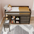 Modern twin loft bed with built-in desk and shelving, dark wood frame, mustard bedding, decorative pillows, yellow desk lamp and patterned rug