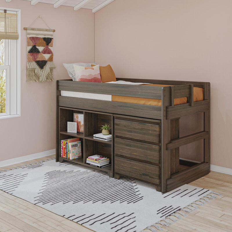 Kids loft bed with storage cubbies and bookshelf in a pink boho bedroom, dark wood frame with decorative pillows and woven wall hanging