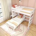 White wooden bunk bed with loft and lower twin, pink accent wall, beige curtains, decorative pillows and desk in kids' bedroom