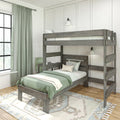 Rustic gray wooden twin-over-twin bunk bed with sage green bedding and curtains in a modern farmhouse kids' bedroom with white paneled wall, study desk, wall sconces and patterned area rug