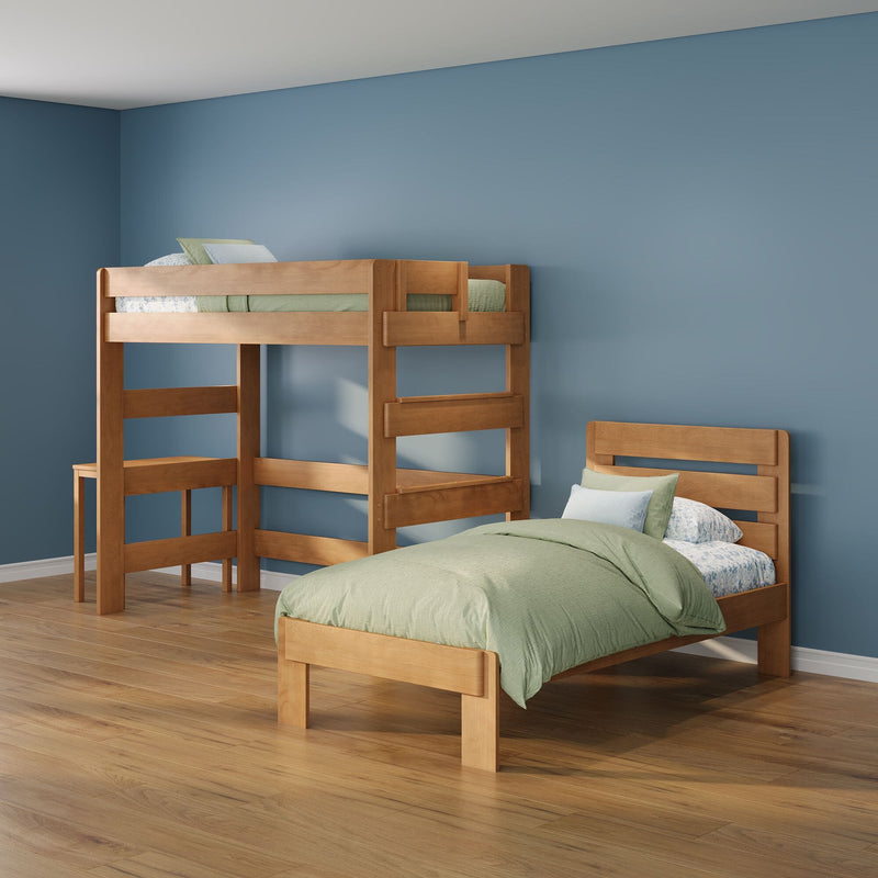 Natural wood bunk beds and twin bed in kids' bedroom with green bedding, blue painted walls and oak hardwood floor