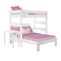 White wooden twin-over-twin bunk bed with pink mattress and pillows, slatted guardrails and ladder for kids' bedroom
