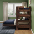 Dark wooden bunk bed in a green paneled bedroom with navy bedding, plaid and green pillows, sheer linen curtains and a sunlit window — modern rustic kids' bedroom design
