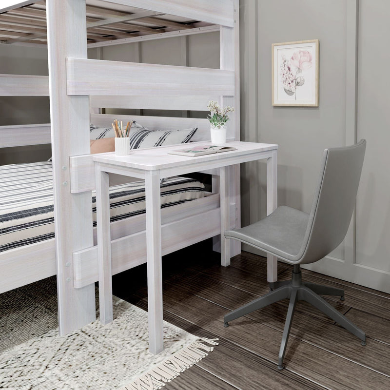 Whitewashed wooden loft bunk bed with integrated desk, grey swivel chair, striped bedding, potted plant and framed floral art in a space-saving kids' bedroom study nook