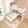 White wooden twin bunk bed with neutral linens, rust and blush throw pillows, cozy boho rug and sheer curtains against a peach accent wall in a bright modern kids' bedroom
