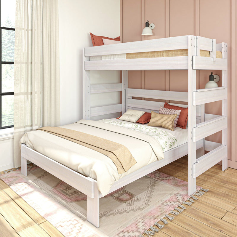 White wooden bunk bed in a modern boho bedroom with neutral linens, rust and blush throw pillows, pink paneled accent wall and sheer window curtains