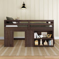 Dark walnut kids loft bed with built-in storage shelves, wooden toys, green bedding and beige paneled wall