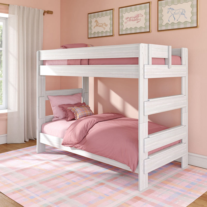 White wooden bunk bed with pink bedding in kids' bedroom, pastel plaid rug, horse wall art and sheer curtains — bunk beds for kids, children's room decor
