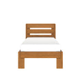 Wooden twin bed frame with slatted headboard and white mattress in natural oak finish on white background
