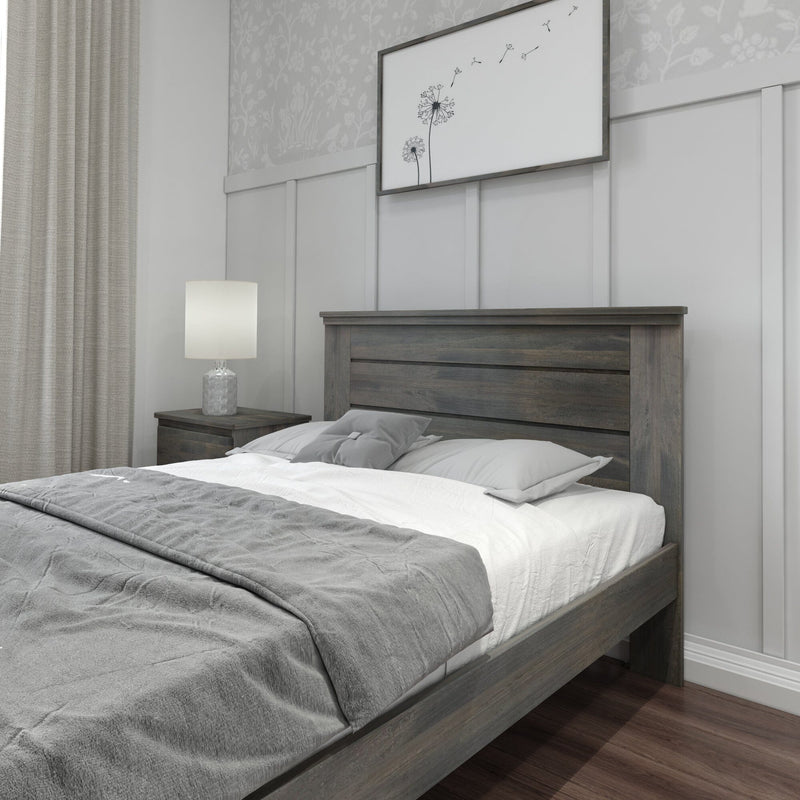 Modern neutral bedroom with gray wooden bed frame, white-and-gray bedding, bedside lamp, nightstand, gray curtains and dandelion wall art