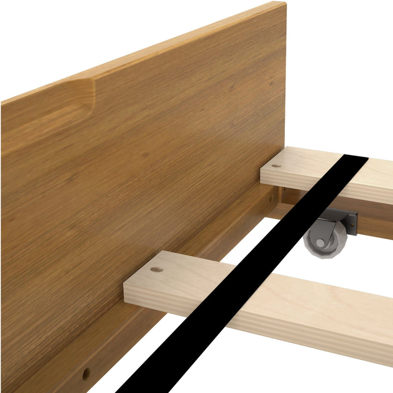 Close-up of wooden bed frame slats and center support with caster wheel and oak headboard detail