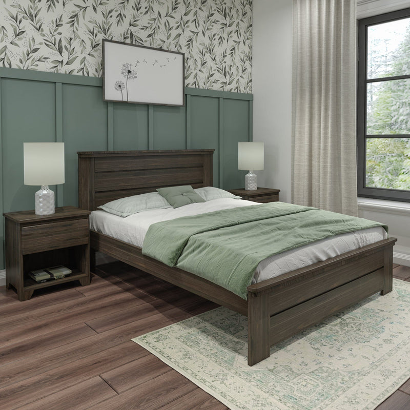 Modern farmhouse bedroom with green board-and-batten headboard, dark wood bed and nightstands, green bedding, floral wallpaper