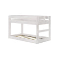 White wooden loft bed frame with upper guardrail and slatted lower platform, twin-size children's loft bed in whitewashed finish