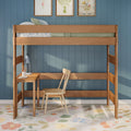 Natural wood kids loft bed with built-in desk and chair against blue paneled wall, floral rug and framed botanical prints