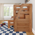 Wooden bunk bed with angled ladder in children's bedroom, blue checkered rug and toy car carrier by window with sheer curtains