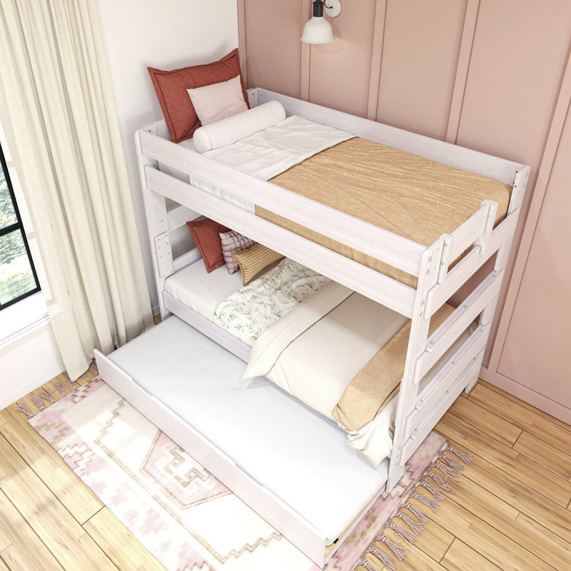 White wooden bunk bed with pull-out trundle in kids' room, neutral beige bedding and rust accent pillows against pink paneled wall and window curtains