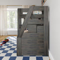 Gray wooden loft bunk bed with diagonal ladder and car-print bedding in a bright kids' bedroom with blue checkered rug and toy cars.