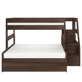 Wooden twin-over-full bunk bed in dark walnut finish with built-in staircase and white mattresses, space-saving loft design