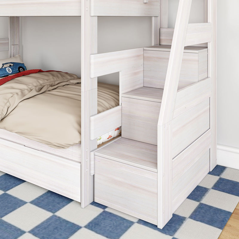 White wooden bunk bed with built-in storage stairs, beige bedding and blue checkered rug in kids' bedroom
