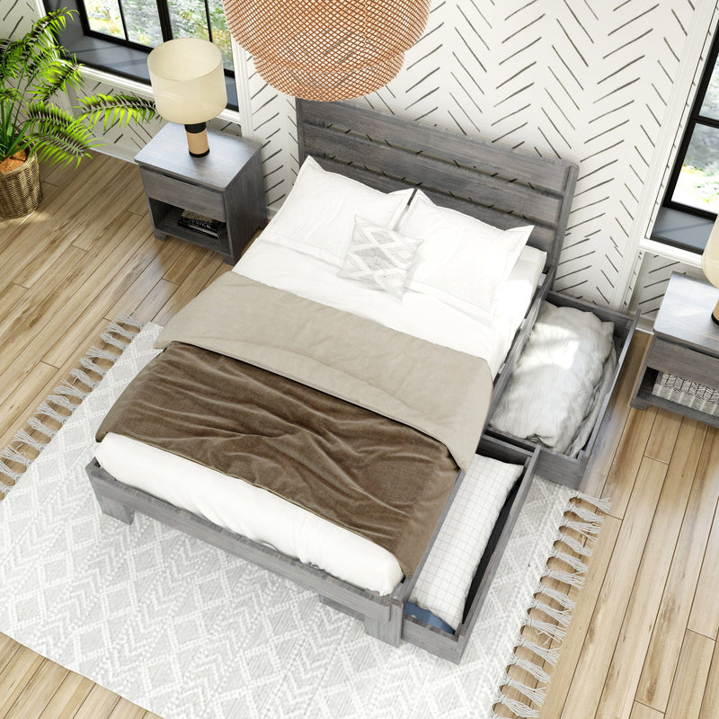 Modern farmhouse bedroom top view featuring a gray wooden storage bed with open under-bed drawers, neutral beige and white bedding, gray nightstand with lamp, woven boho pendant light, patterned accent wall, potted plant and hardwood floors