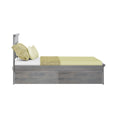 Grey wooden single bed with sage-green sheets, textured throw and pillows, modern bedroom frame with under-bed storage drawers