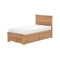 Oak single bed frame with white mattress and built-in underbed storage drawers, modern slatted headboard