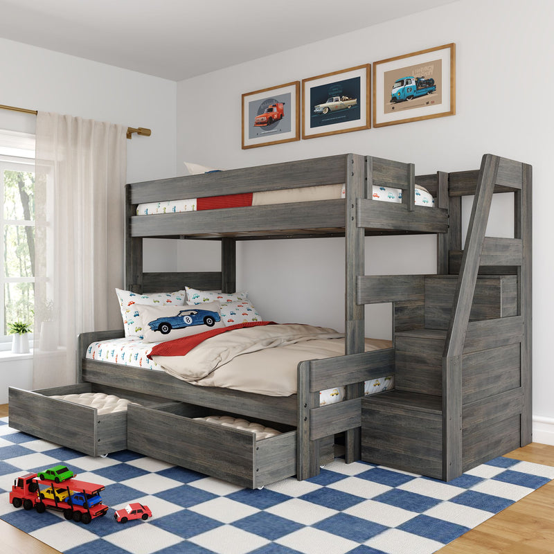 Gray wooden bunk bed with pull-out drawers, car-themed bedding and framed car prints in bright kids bedroom