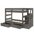 Gray wooden twin-over-full bunk bed with staircase and built-in under-bed storage drawers, space-saving kids loft bed